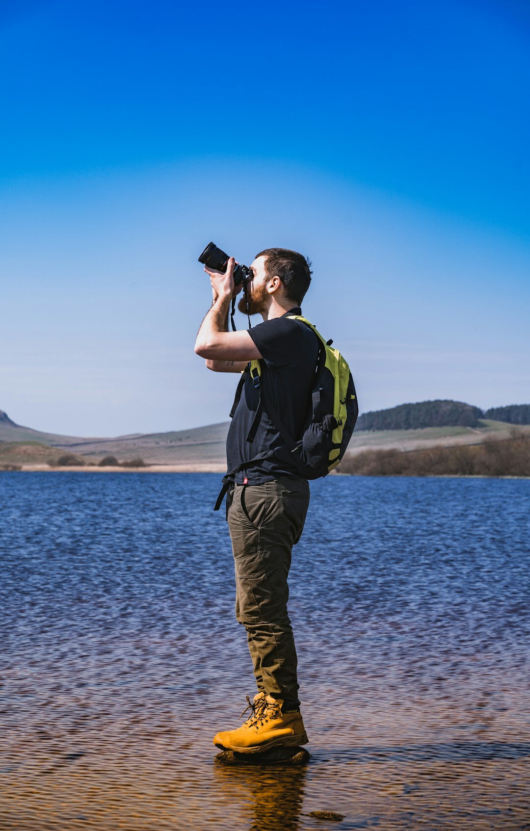photographer taking picture during hike