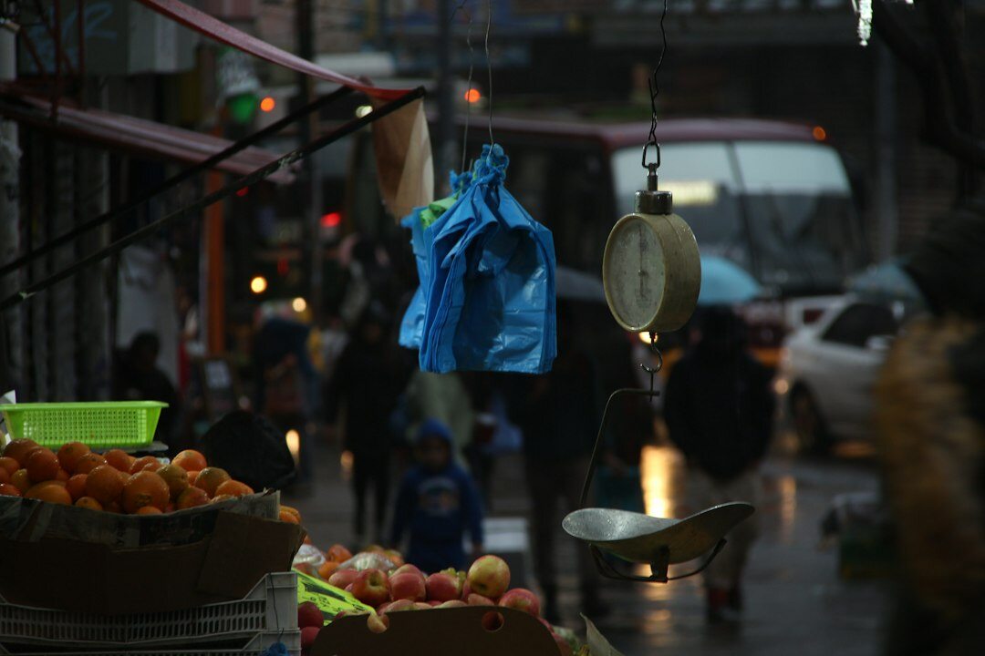Vendors and shoppers at a busy street market in Valparaiso