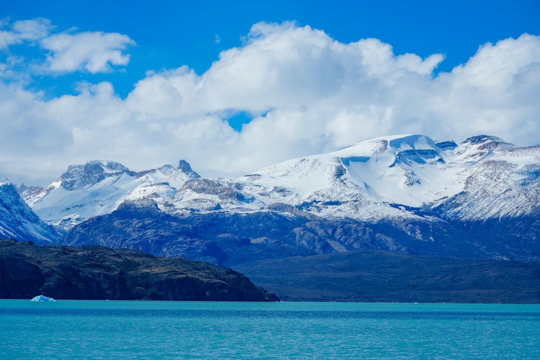 Snow-capped Andes mountains reflected in a Patagonian lake