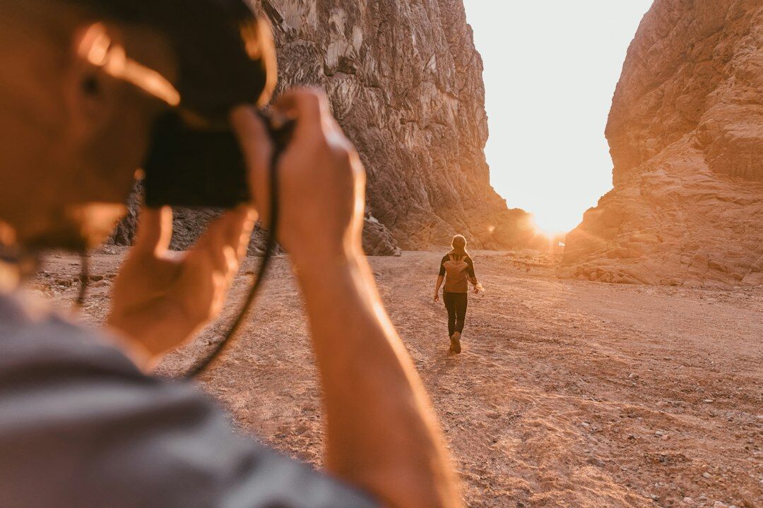 photographer capturing defining adventure moments